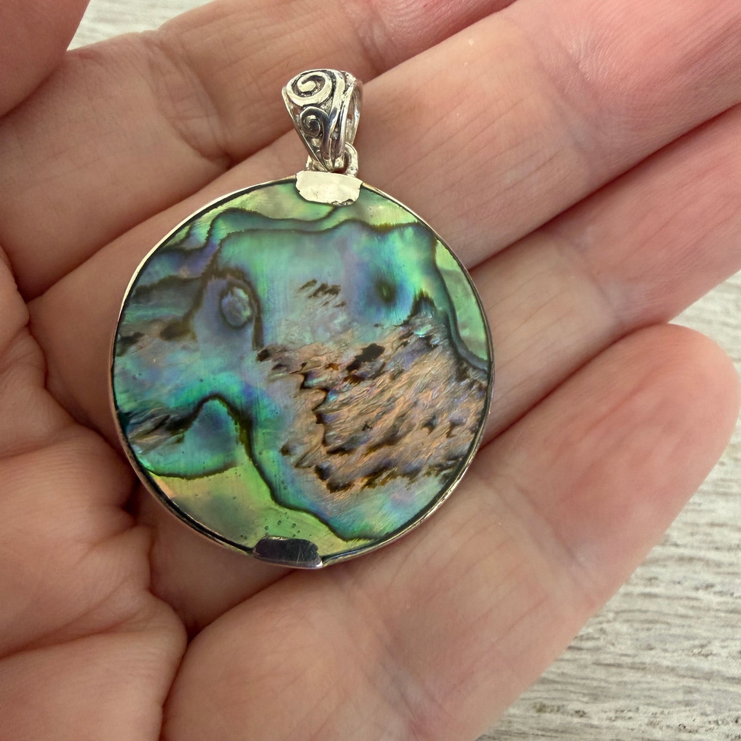 Sterling Silver Dolphin Pendant with Blue Abalone Shell Backing