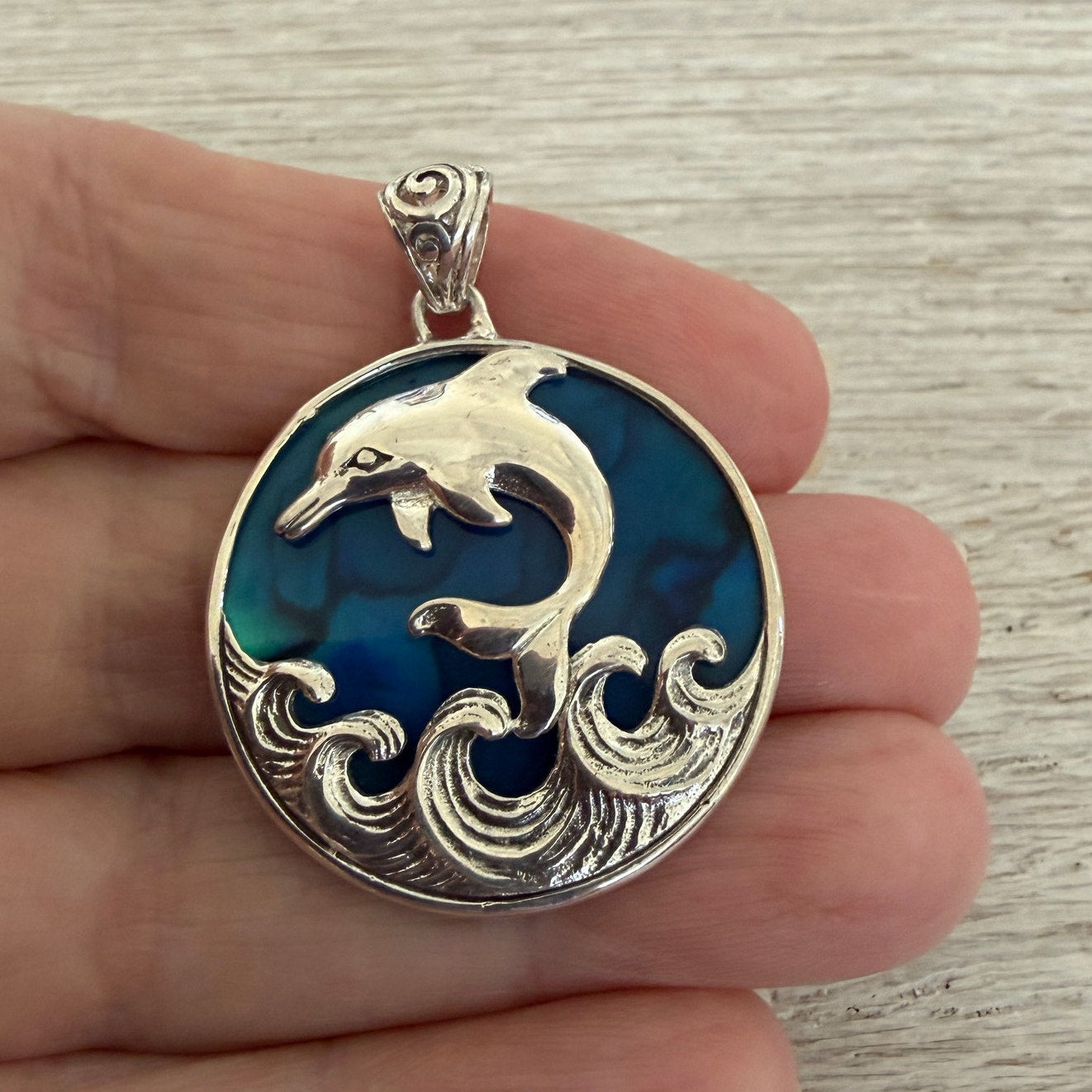 Sterling Silver Dolphin Pendant with Blue Abalone Shell Backing