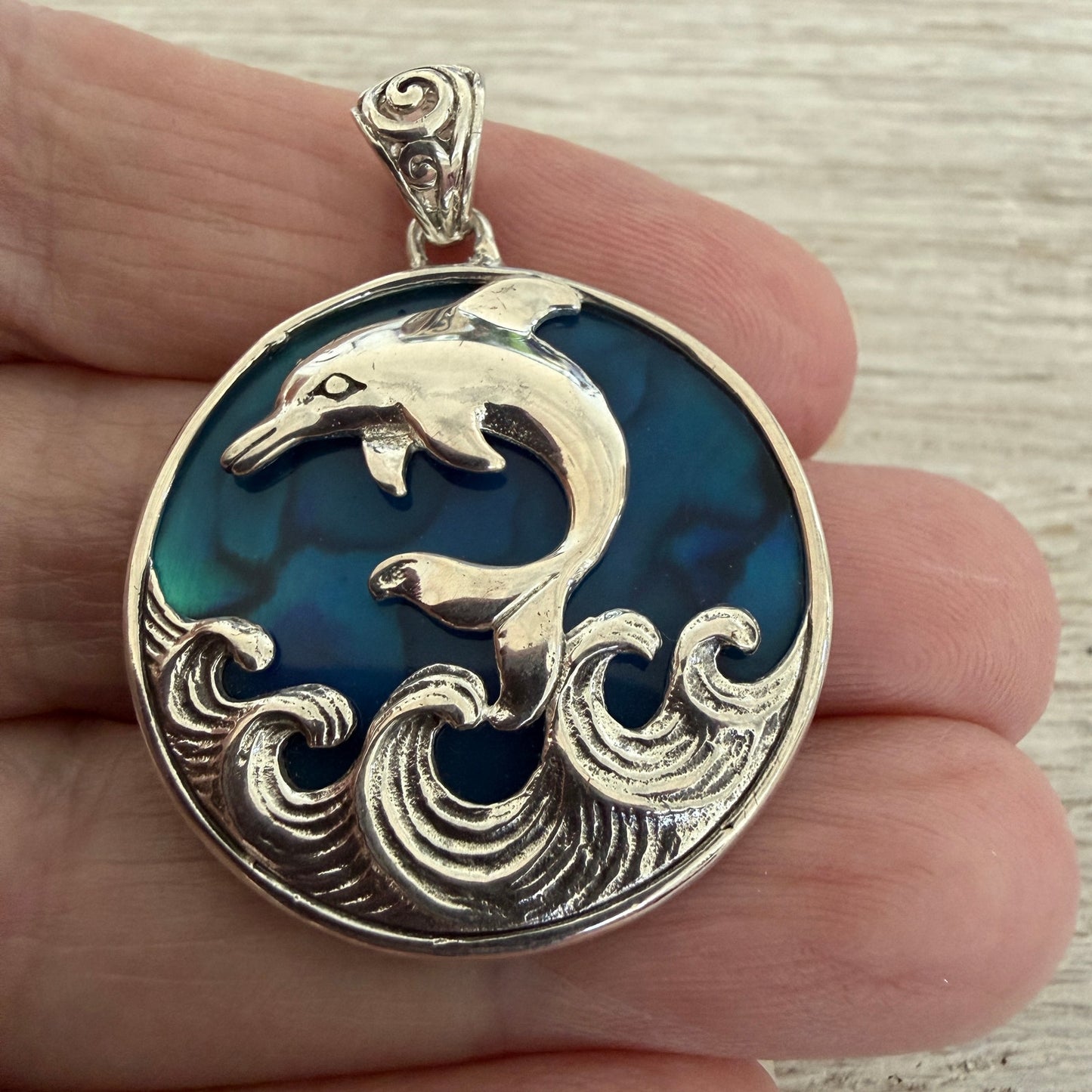 Sterling Silver Dolphin Pendant with Blue Abalone Shell Backing